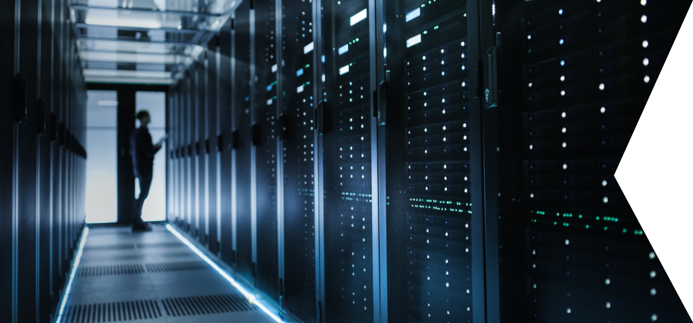 A photo of a man in a server room